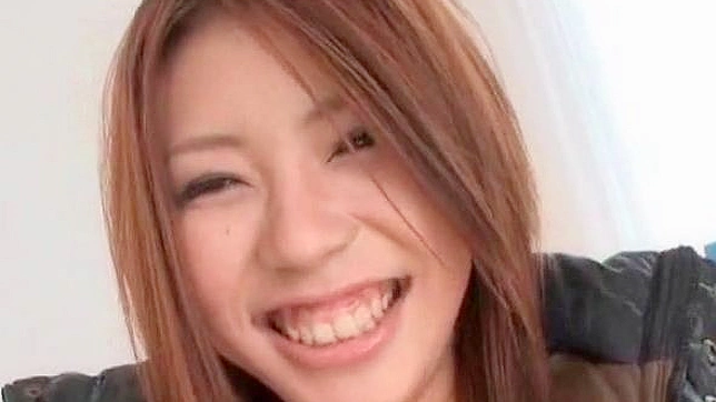 Asian girl fondles her moist pubic cunt