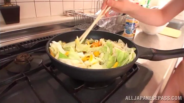 Busty Airi Suzumura gets horny in the kitchen 3