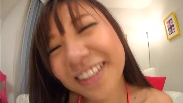 Busty Japanese sex doll Karen Nishishino plays with a huge dildo dong