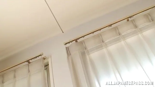 Adorable Japanese babe Tsubomi frills her slit with a sex toy