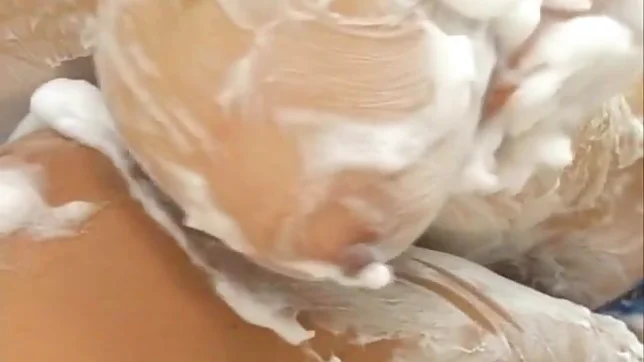 Moka Asian model plays with cock in the shower 3