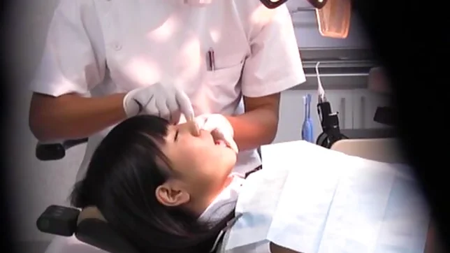 Juicy Japanese AV model is screwed by a horny dentist