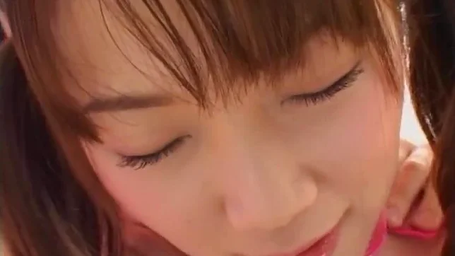 Horny young Japanese AV Model with pigtails sucks two dicks 3